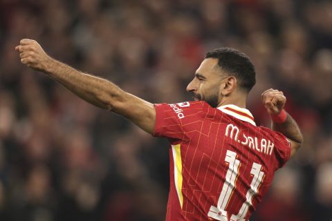 Liverpool's Mohamed Salah celebrates after scoring his side's second goal during the Champions League soccer match between Liverpool and Bologna at the Anfield stadium in Liverpool, England, Wednesday, Oct. 2, 2024. (AP Photo/Ian Hodgson)