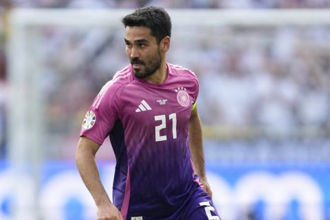 Germany's Ilkay Gundogan dribbles during a Group A match between Germany and Hungary at the Euro 2024 soccer tournament in Stuttgart, Germany, Wednesday, June 19, 2024. (AP Photo/Darko Vojinovic)