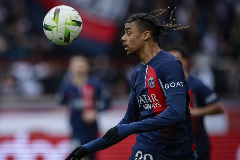 PSG's Bradley Barcola controls the ball during the French League One soccer match between Paris Saint-Germain and Reims at the Parc des Princes stadium in Paris, France, Sunday, March 10, 2024. (AP Photo/Aurelien Morissard)