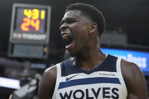 Minnesota Timberwolves guard Anthony Edwards celebrates during the second half of an NBA basketball game against the Golden State Warriors in San Francisco, Friday, Dec. 6, 2024. (AP Photo/Jeff Chiu)