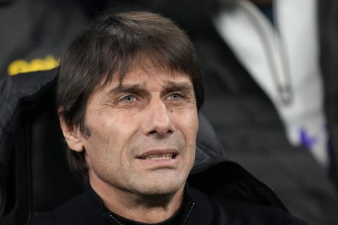 Tottenham's head coach Antonio Conte attends the Champions League, round of 16, first leg soccer match between AC Milan and Tottenham Hotspur at the San Siro stadium in Milan , Italy, Tuesday, Feb. 14, 2023. (AP Photo/Luca Bruno)