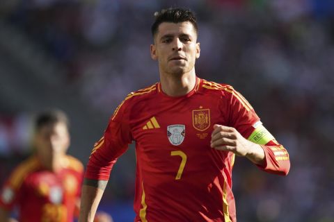 Spain's Alvaro Morata celebrates after scoring the opening goal of his team during a Group B match between Spain and Croatia at the Euro 2024 soccer tournament in Berlin, Germany, Saturday, June 15, 2024. (AP Photo/Sunday Alamba)