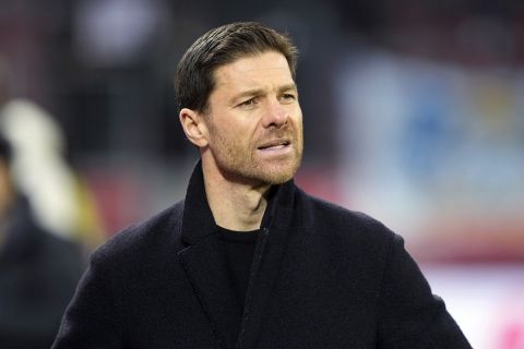 FILE - Leverkusen's head coach Xabi Alonso looks on during the German Bundesliga soccer match against Borussia Dortmund at the BayArena in Leverkusen, Germany, Sunday, Jan. 29, 2023. Xabi Alonso has extended his contract as coach of German club Bayer Leverkusen through to 2026 after a strong first season led to speculation linking him with some of Europes top teams, it was announced Friday, Aug. 4. Alonso took over Leverkusen in October when it was second-to-last in the Bundesliga. (AP Photo/Martin Meissner, file)