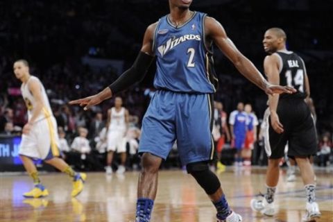 Rookie John Wall, of the Washington Wizards, celebrates after a dunk during the second half of the Rookie Challenge game during the NBA basketball All-Star Weekend, Friday, Feb. 18, 2011, in Los Angeles. Wall was named MVP as the rookies beat the sophomores 148-140. (AP Photo/Mark J. Terrill)