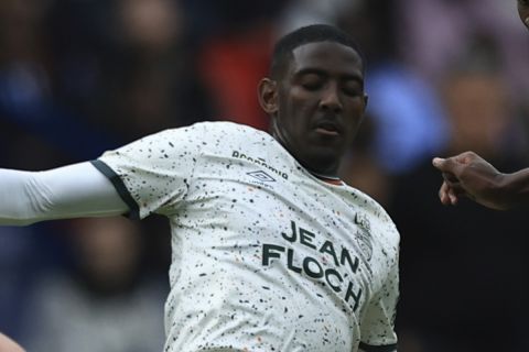 PSG's Danilo Pereira, right, dribbles Lorient's Ayman Kari, center, and Lorient's Laurent Abergel during the French League One soccer match between Paris Saint-Germain and Lorient, at the Parc des Princes stadium in Paris, Sunday, April 30, 2023. (AP Photo/Aurelien Morissard)