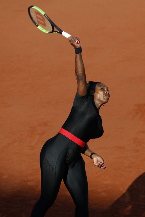 Serena Williams of the U.S. serves against Germany's Julia Georges during their third round match of the French Open tennis tournament at the Roland Garros stadium in Paris, France, Saturday, June 2, 2018. (AP Photo/Christophe Ena)