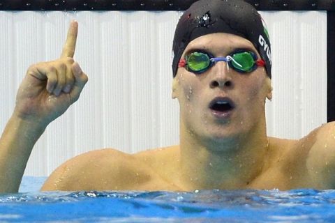 Hungary's Daniel Gyurta reacts after he competed in the men's 200m breaststroke during the swimming event at the London 2012 Olympic Games on July 31, 2012 in London.  AFP PHOTO / FABRICE COFFRINI        (Photo credit should read FABRICE COFFRINI/AFP/GettyImages)