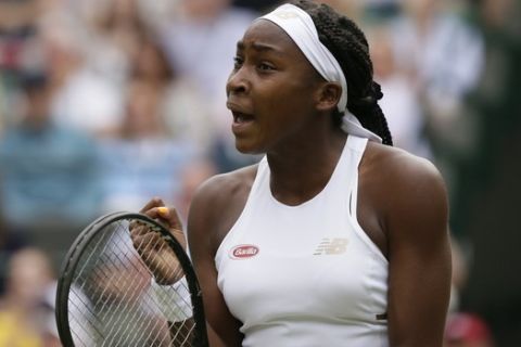 United States' Cori "Coco" Gauff reacts after winning the first set against the United States's Venus Williams in a Women's singles match during day one of the Wimbledon Tennis Championships in London, Monday, July 1, 2019. (AP Photo/Tim Ireland)