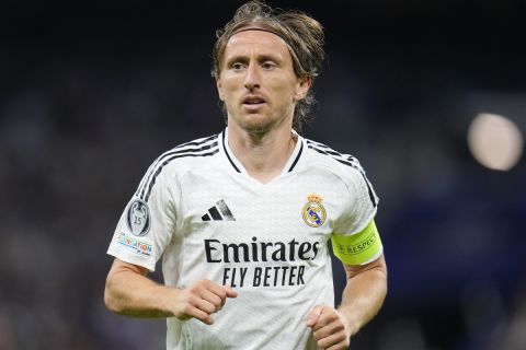 Real Madrid's Luka Modric during the Champions League opening phase soccer match between Real Madrid and Borussia Dortmund at the Santiago Bernabeu stadium in Madrid, Tuesday, Oct. 22, 2024. (AP Photo/Manu Fernandez)