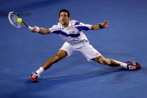 MELBOURNE, AUSTRALIA - JANUARY 30:  Novak Djokovic of Serbia plays a forehand in his men's final match against Andy Murray of Great Britain during day fourteen of the 2011 Australian Open at Melbourne Park on January 30, 2011 in Melbourne, Australia.  (Photo by Mark Kolbe/Getty Images)