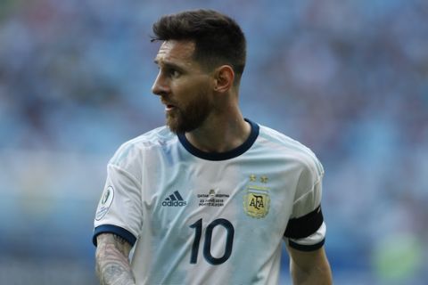 Argentina's Lionel Messi looks across the pitch during a Copa America Group B soccer match against Qatar at Arena do Gremio, Porto Alegre, Brazil, Sunday, June 23, 2019. (AP Photo/Victor R. Caivano)