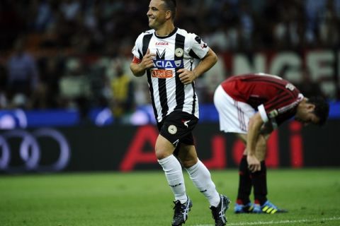 Udinese Antonio Di Natale (L) celebrates aftre scoring against AC Milan during their Serie A football match in Milan's San Siro Stadium on September 21, 2011 . AFP PHOTO / Filippo MONTEFORTE (Photo credit should read FILIPPO MONTEFORTE/AFP/Getty Images)