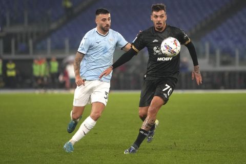 Lazio's Mario Gila, left, and Cagliari's Gianluca Gaetano vie for the ball during a Serie A soccer match between Lazio and Cagliari, at Rome's Olympic stadium, Monday, Nov. 4, 2024. (AP Photo/Alessandra Tarantino)