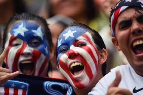 RECIFE, BRAZIL - JUNE 26: United States fans cheer during the 2014 FIFA World Cup Brazil group G match between the United States and Germany at Arena Pernambuco on June 26, 2014 in Recife, Brazil.  (Photo by Jamie McDonald/Getty Images)