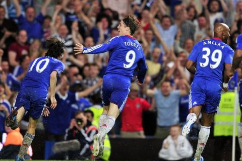 Chelsea's Spanish striker Fernando Torres (2nd L) celebrates scoring a Chelsea's third goal (his first for Chelsea) with Israeli midfielder Yossi Benayoun (L) and French striker Nicolas Anelka (R) during the English Premier League football match between Chelsea and West Ham United at Stamford Bridge in London, on April 23, 2011. AFP PHOTO/GLYN KIRKFOR EDITORIAL USE ONLY Additional licence required for any commercial/promotional use or use on TV or internet (except identical online version of newspaper) of Premier League/Football League photos. Tel DataCo +44 207 2981656. Do not alter/modify photo. (Photo credit should read GLYN KIRK/AFP/Getty Images)