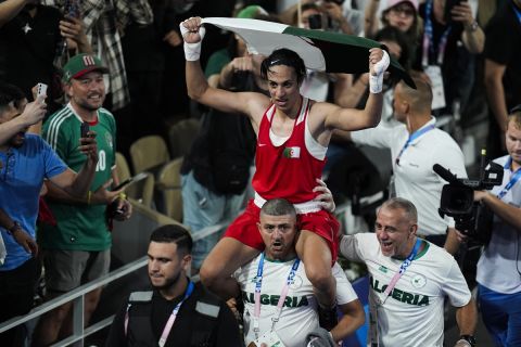 Algeria's Imane Khelif celebrates after defeating China's Yang Liu in their women's 66 kg final boxing match at the 2024 Summer Olympics, Friday, Aug. 9, 2024, in Paris, France. (AP Photo/John Locher)