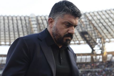 Napoli coach Gennaro Gattuso walk the pitch after the first half of the Italian Serie A soccer match between Napoli and Lecce at the San Paolo stadium in Naples, Italy, Sunday, Feb. 9, 2020. (Cafaro/LaPresse via AP)