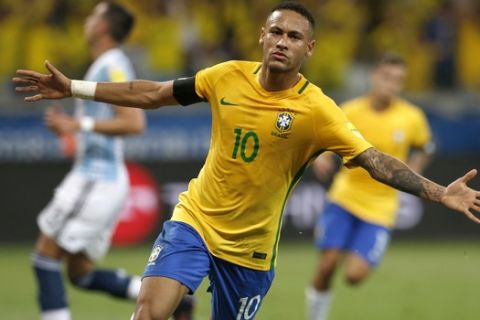 FILE - In this Nov. 10, 2016 file photo, Brazil's Neymar celebrates after scoring his side's second goal against Argentina during a 2018 World Cup qualifying soccer match in Belo Horizonte, Brazil. Brazils national soccer team is the first to qualify for next years World Cup. Despite the success, the sporting scene at home is littered with bribes and corruption linked to the World Cup and last years Rio de Janeiro Olympics.
 (AP Photo/Leo Correa, File)