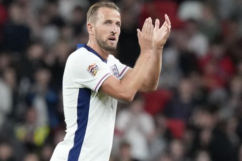 England's Harry Kane celebrates after scoring his side's second goal during the Group F UEFA Nations League soccer match between England and Finland at Wembley Stadium in London, Tuesday, Sept. 10, 2024. (AP Photo/Frank Augstein)