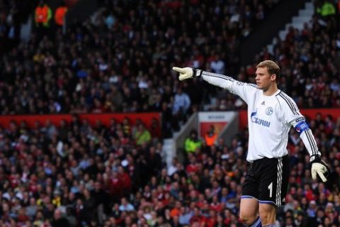 Schalke's goalkeeper Manuel Neuer gestures during the UEFA Champions League semi-final second leg football match between Manchester United and FC Schalke at Old Trafford in Manchester, north-west England on May 4, 2011. Manchester won by 4-1 and qualified for the final.   AFP PHOTO / PATRIK STOLLARZ (Photo credit should read PATRIK STOLLARZ/AFP/Getty Images)