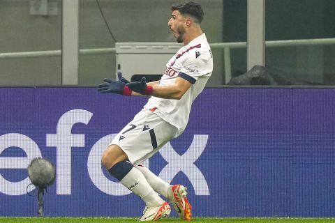 Bologna's Riccardo Orsolini celebrates scoring his side's 2nd goal from the penalty spot during the Serie A soccer match between AC Milan and Bologna at the San Siro stadium, in Milan, Italy, Saturday, Jan. 27, 2024. (AP Photo/Antonio Calanni)