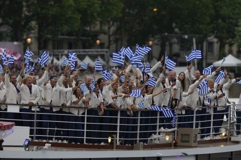 Team Greece-s boat parades along the Seine river in Paris, France, during the opening ceremony of the 2024 Summer Olympics, Friday, July 26, 2024. (AP Photo/Luca Bruno)