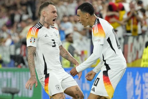 Germany's Jamal Musiala celebrates after scoring his side's second goal during a round of sixteen match between Germany and Denmark at the Euro 2024 soccer tournament in Dortmund, Germany, Saturday, June 29, 2024. (AP Photo/Andreea Alexandru)