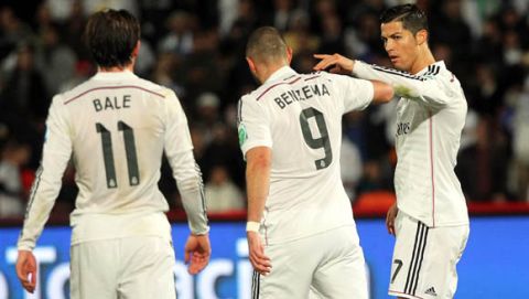 epa04531629 Real Madrid players (L-R) Gareth Bale, Karim Benzema, and Cristiano Ronaldo celebrate during the FIFA Club World Cup 2014 semi final soccer match between Cruz Azul and Real Madrid in Marrakech, Morocco, 16 December 2014. Real Madrid won 4-0.  EPA/KHALED ELFIQI