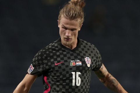 Croatia's Tin Jedvaj during the UEFA Nations League soccer match between Portugal and Croatia at the Dragao stadium in Porto, Portugal, Saturday, Sept. 5, 2020. (AP Photo/Miguel Angelo Pereira)