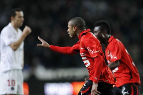 Yacine Brahimi (C) of Stade Rennes celebrates after scoring during his French Ligue 1 soccer match against Paris Saint Germain at the Route de Lorient stadium in Rennes February 5, 2011. REUTERS/Stephane Mahe (FRANCE - Tags: SPORT SOCCER)