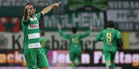 Fuerth's Spanish forward Sercan Sararer (L) celebrates during the German first division Bundesliga football match Eintracht Frankfurt vs SpVgg Greuther Fuerth in Frankfurt am Main, central Germany on November 2, 2012.   AFP PHOTO / DANIEL ROLAND

RESTRICTIONS / EMBARGO - DFL RULES TO LIMIT THE ONLINE USAGE DURING MATCH TIME TO 15 PICTURES PER MATCH. IMAGE SEQUENCES TO SIMULATE VIDEO IS NOT ALLOWED AT ANY TIME. FOR FURTHER QUERIES PLEASE CONTACT DFL DIRECTLY AT + 49 69 650050.        (Photo credit should read DANIEL ROLAND/AFP/Getty Images)