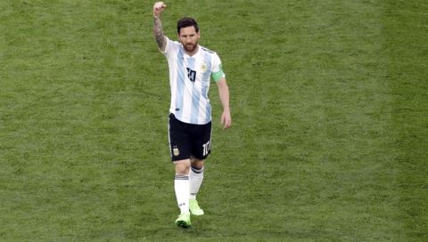 Argentina's Lionel Messi celebrates after scoring the opening goal during the group D match between Argentina and Nigeria, at the 2018 soccer World Cup in the St. Petersburg Stadium in St. Petersburg, Russia, Tuesday, June 26, 2018. (AP Photo/Michael Sohn)