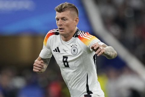 Germany's Toni Kroos runs during the Group A match between Germany and Scotland at the Euro 2024 soccer tournament in Munich, Germany, Friday, June 14, 2024. (AP Photo/Antonio Calanni)