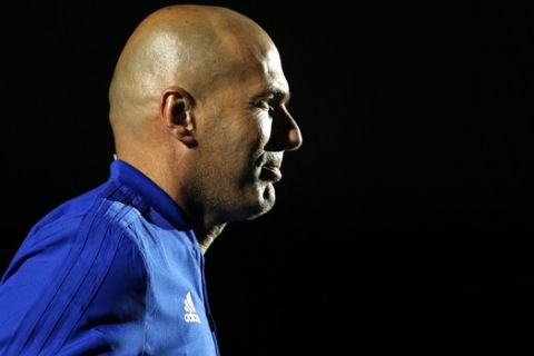 Former Real Madrid head coach Zinedine Zidane arrives to attend a charity soccer match between members of the 1998 World Cup winning French team and a team of international veteran players who were also involved in the same tournament, at the U Arena in Nanterre, north of Paris, France, Tuesday, June 12, 2018. (AP Photo/Thibault Camus)