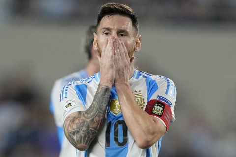 Argentina's Lionel Messi reacts after missing an opportunity to score during a World Cup 2026 qualifying soccer match against Bolivia at Monumental stadium in Buenos Aires, Argentina, Tuesday, Oct. 15, 2024. (AP Photo/Natacha Pisarenko)