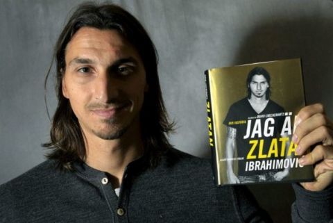 This picture taken on November 8, 2011 and made available today shows AC Milan's and Sweden's football player Zlatan Ibrahimovic presenting his book "I Am Zlatan" during a press conference in Stockholm. AFP PHOTO / SCANPIX - JANERIK HENRIKSSON