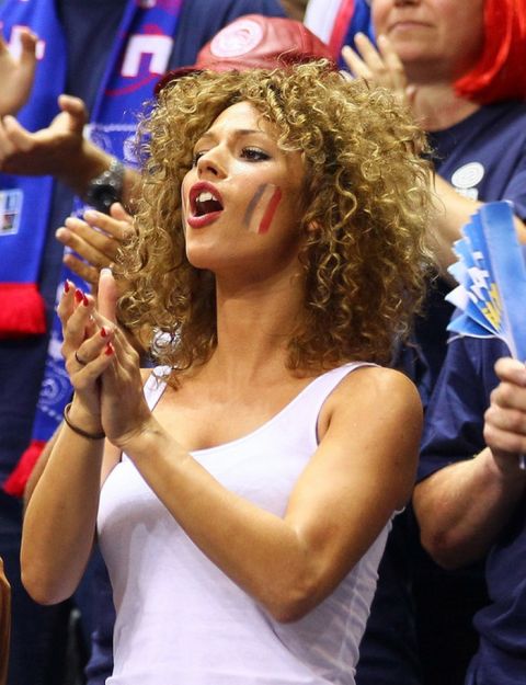 SIAULIAI, LITHUANIA - SEPTEMBER 05: The girl-friend of Nicolas Batum of France celebrates the team during the EuroBasket 2011 first round group B match between Serbia and France at Siauliai Arena on September 5, 2011 in Siauliai, Lithuania. (Photo by Christof Koepsel/Bongarts/Getty Images)