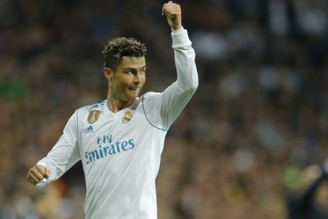 Real Madrid's Cristiano Ronaldo gives thumb-up during the Champions League semifinal second leg soccer match between Real Madrid and FC Bayern Munich at the Santiago Bernabeu stadium in Madrid, Spain, Tuesday, May 1, 2018. (AP Photo/Paul White)