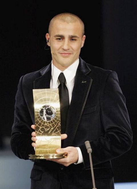 ZURICH, SWITZERLAND - DECEMBER 18:  Fabio Cannavaro of Italy and Real Madrid receives The FIFA World Player of the Year Award at the Zurich Opera House on December 18, 2006 in Zurich, Switzerland.  (Photo by Christopher Lee/Getty Images)