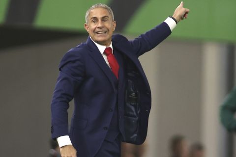 Albania's head coach Sylvinho gives instructions from the side line during the Euro 2024 group E qualifying soccer match between Albania and Czech Republic at Air Albania stadium in Tirana, Albania, Thursday, Oct. 12, 2023. (AP Photo/Franc Zhurda)