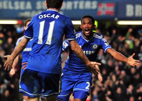 Chelsea's Cameroonian striker Samuel Etoo (R) celebrates scoring their second goal during the English Premier League football match between Chelsea and Liverpool at Stamford Bridge in London on December 29, 2013.  AFP PHOTO / GLYN KIRK

RESTRICTED TO EDITORIAL USE. No use with unauthorized audio, video, data, fixture lists, club/league logos or live services. Online in-match use limited to 45 images, no video emulation. No use in betting, games or single club/league/player publications.        (Photo credit should read GLYN KIRK/AFP/Getty Images)