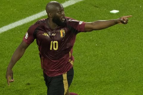 Belgium's Romelu Lukaku celebrates after scoring a goal that was then disallowed for offside during a Group E match between Belgium and Romania at the Euro 2024 soccer tournament in Cologne, Germany, Saturday, June 22, 2024. (AP Photo/Frank Augstein)