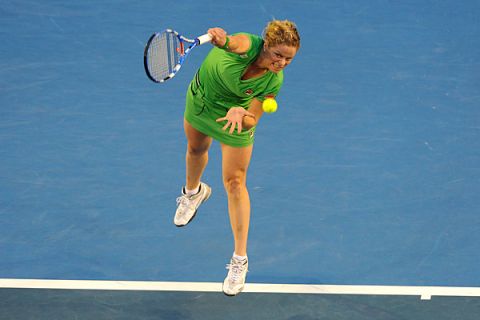 Kim Clijsters serves during the women's final against Li Na.