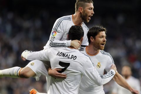 Partido de la Liga BBVA disputado entre el Real Madrid y el Levante. En la imagen, Cristiano Ronaldo celebra el primer tanto con Sergio Ramos y Xabi Alonso. 

League BBVA match played between Real Madrid and Levante. In this picture, Cristiano Ronaldo celebrates first goal with Sergio Ramos and Xabi Alonso.