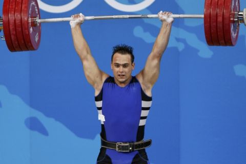 Ilya Ilin of Kazakhstan competes in the men's 94kg Group A weightlifting clean & jerk competition at the Beijing 2008 Olympic Games August 17, 2008.     REUTERS/Yves Herman (CHINA)