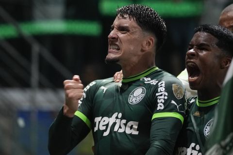 Joaquin Piquerez of Brazil's Palmeiras celebrates scoring his side's opening goal against Argentina's Boca Juniors during a Copa Libertadores semifinal second leg soccer match at Allianz Parque stadium in Sao Paulo, Brazil, Thursday, Oct. 5, 2023. (AP Photo/Andre Penner)