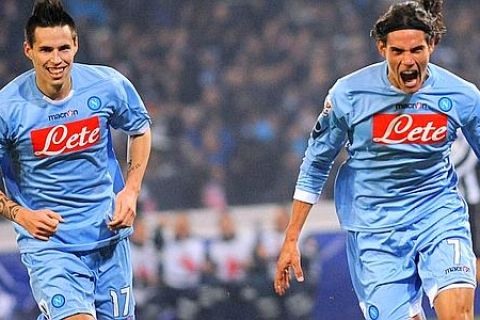 Edinson Cavani (R) of Napoli with Marek Hamsik (L) of Napoli jubilates after scoring during Serie A soccer match Napoli-Juventus at ''San Paolo'' stadium in Naples, on 9 January 2011. 
ANSA/OLIMPO-PRIMA PAGINA