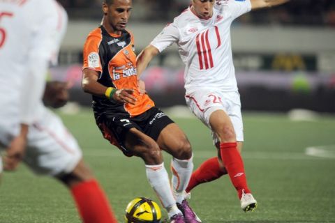 Lorient's Togolese midfielder Jacques-alaixys Romao (L) vies with Lille's Belgian midfielder Eden Hazard (R) during their French L1 football match Lorient vs. Lille, on April 24, 2011 at the Moustoir stadium in Lorient, western France. AFP PHOTO / FRANK PERRY (Photo credit should read FRANK PERRY/AFP/Getty Images)