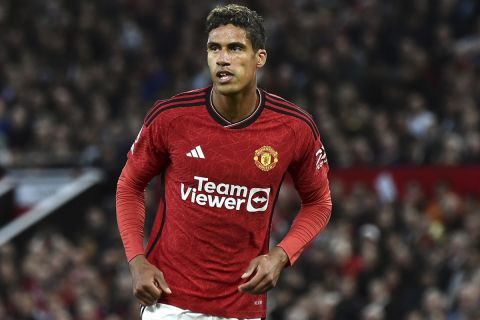 Manchester United's Raphael Varane during the English Premier League soccer match between Manchester United and Wolverhampton Wanderers at the Old Trafford stadium in Manchester, England, Monday, Aug. 14, 2023. (AP Photo/Rui Vieira)