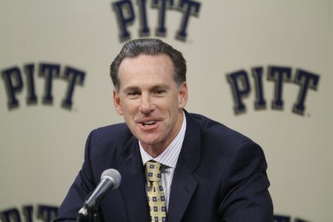 FILE - This Oct. 14, 2010 file photo shows Pittsburgh's head basketball coach Jamie Dixon during the annual media day for the upcoming season for the NCAA college basketball team in Pittsburgh. A University of Pittsburgh spokesman says Dixon helped rescue two men from a car accident near the city on Saturday, Oct. 23, 2010. (AP Photo/Keith Srakocic, file)